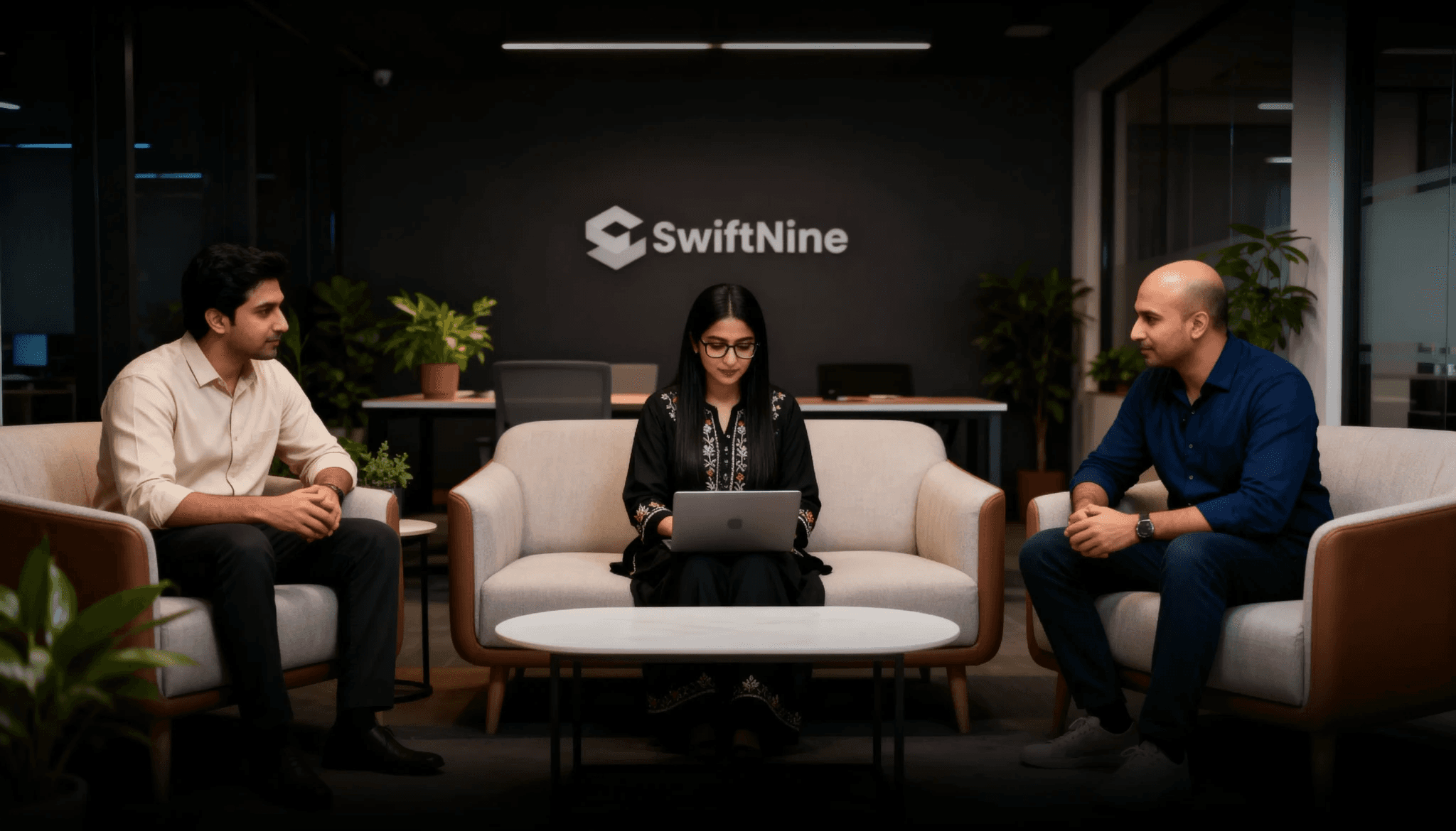 SwiftNine team in the office